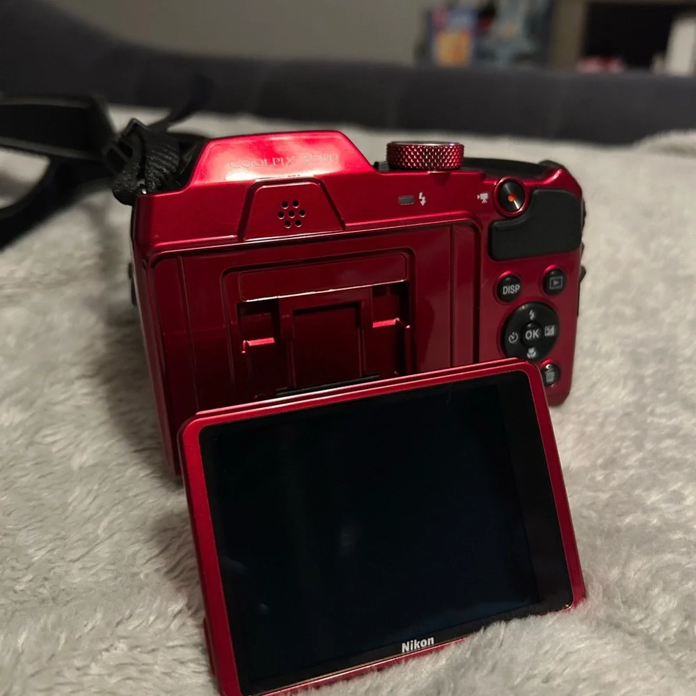 Nikon Coolpix B500. Red Digital Camera with Zoom Lens and Black Strap